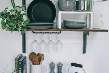 pans and plates on rack