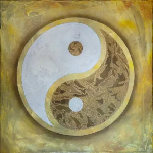 white and brown round decor in the shape of the yin and yang symbol