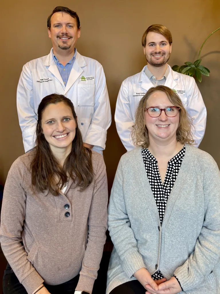 Photo of the staff at Acupuncture & Holistic Health Associates - showing the acupuncturists and the office staff.